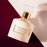 Carven Pour Elle Eau de Parfum Flakon, cremeweiße Flasche mit goldener Schraubkappe