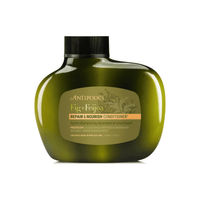 Conditioner-Flasche „Fig + Feijoa“ Repair & Nourish, dunkelgrün mit Etikett und schwarzer Kappe